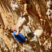busby wrestling with a big tufastalactite